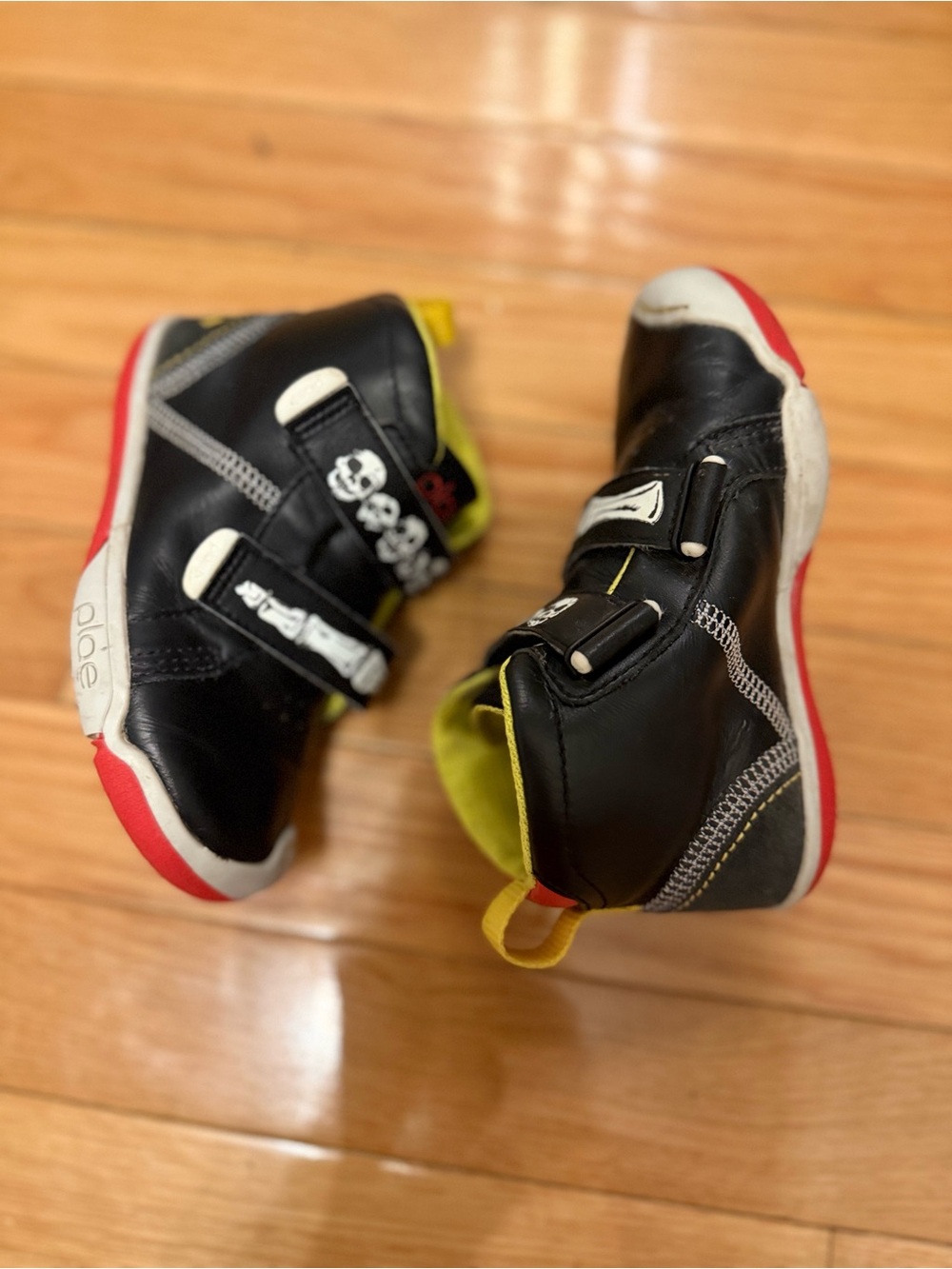 PLAE Kids Black Sneakers with Red and Yellow Accents